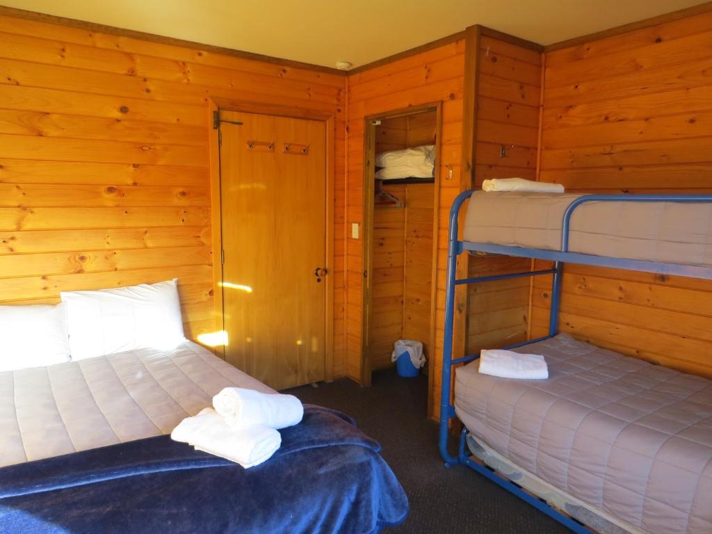 Postel nebo postele na pokoji v ubytování Altamont Lodge