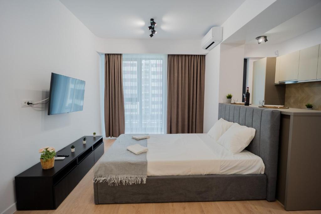 Ένα ή περισσότερα κρεβάτια σε δωμάτιο στο Tranquil Living nearby Parcul Politehnicii
