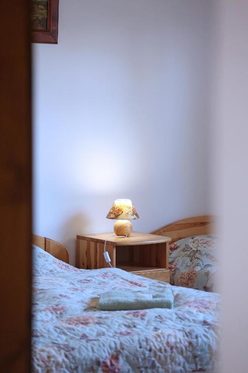 Postel nebo postele na pokoji v ubytování Füzesi Papa Vendégháza