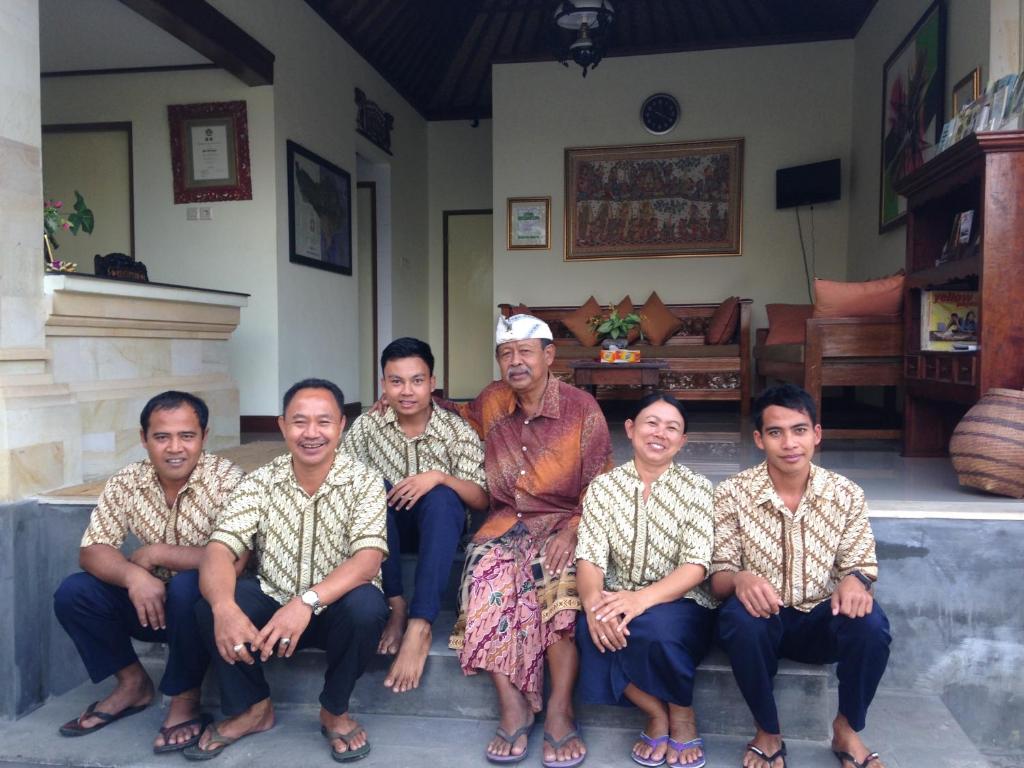 a group of people posing for a picture at Bali Breeze Bungalows in Ubud