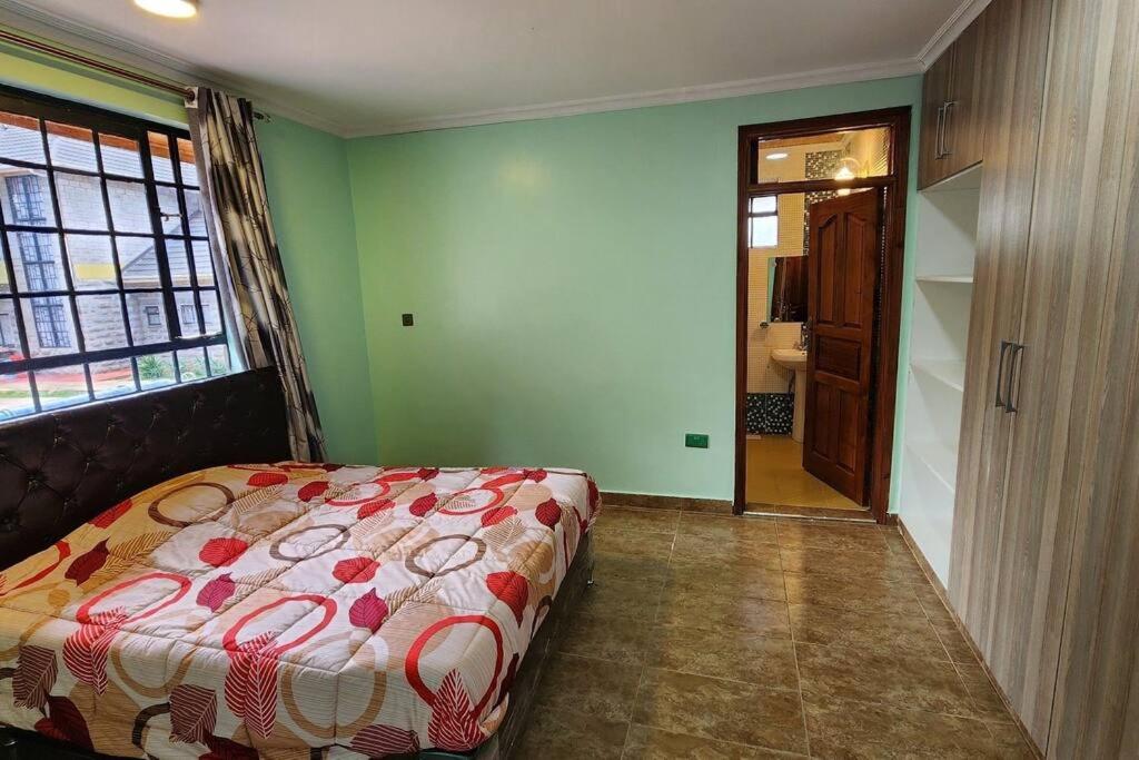 Rúm í herbergi á Ace House
