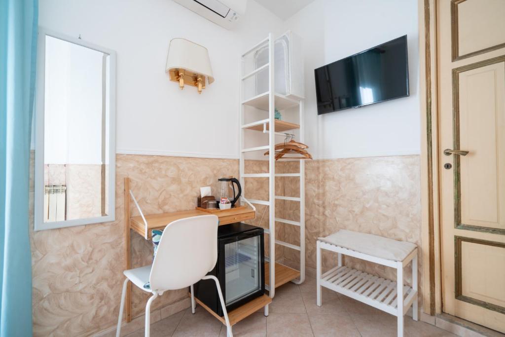 TV a/nebo společenská místnost v ubytování Hotel Ascot
