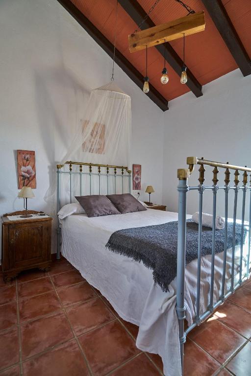 Postel nebo postele na pokoji v ubytování Villa Botero