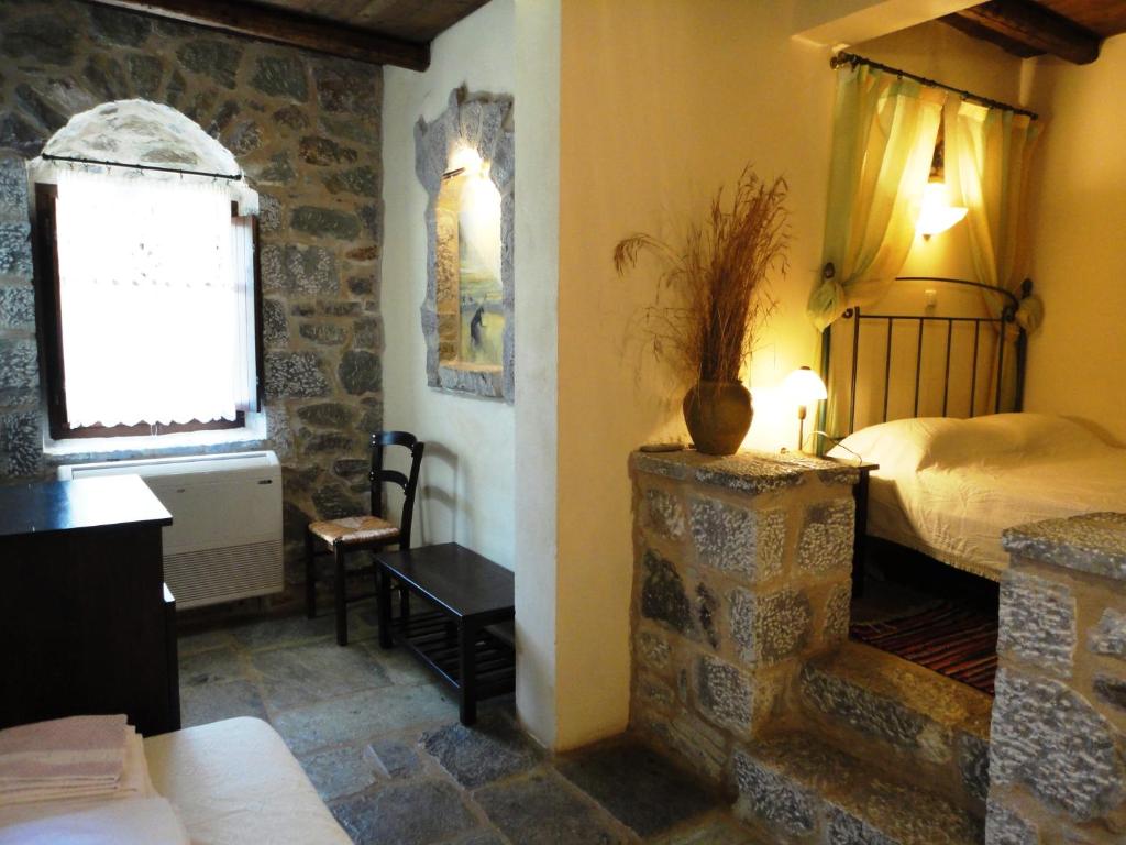 Postel nebo postele na pokoji v ubytování Psamathous Guesthouse