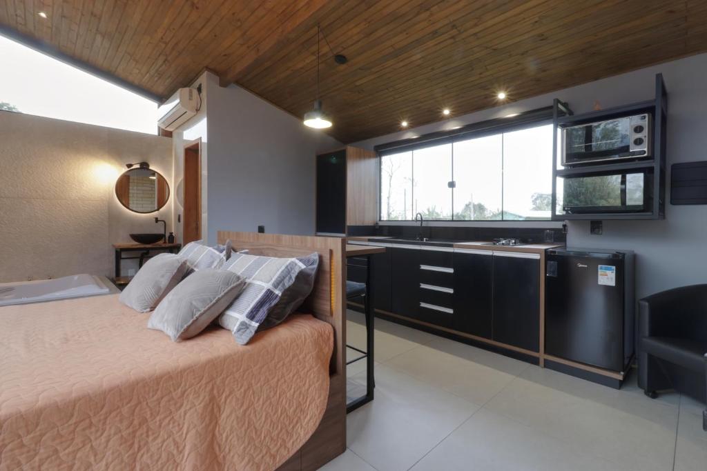 Ένα ή περισσότερα κρεβάτια σε δωμάτιο στο Sua Casa - Nos Canyons