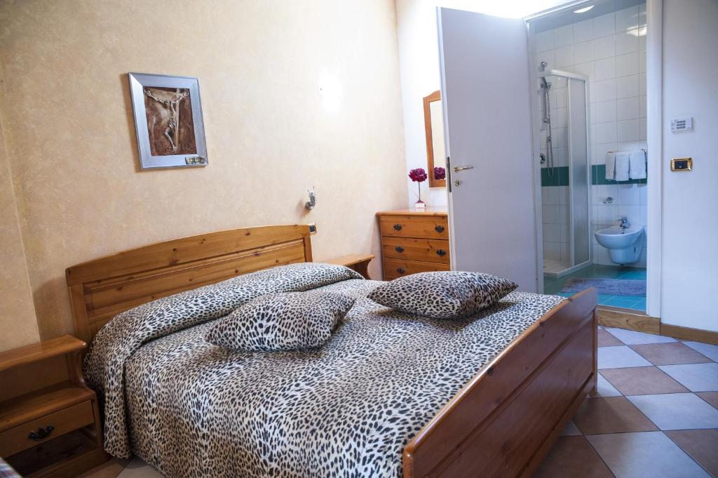 Postel nebo postele na pokoji v ubytování Casa Hellen