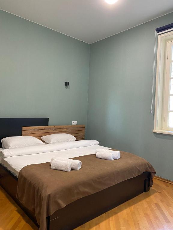 Postel nebo postele na pokoji v ubytování Boutique hotel RaqWine