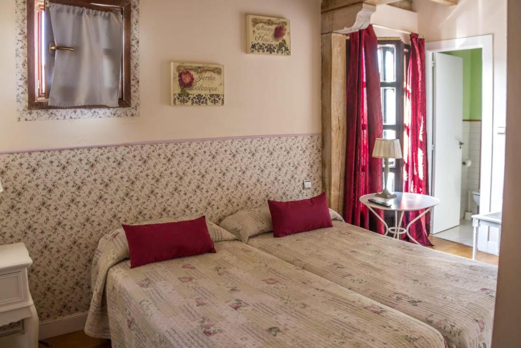 Postel nebo postele na pokoji v ubytování Agua Viva Eco H Wellness Castro Urdiales