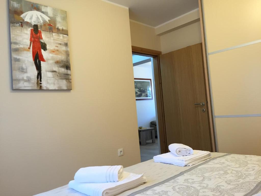 Łóżko lub łóżka w pokoju w obiekcie Apartments Sanbrandin