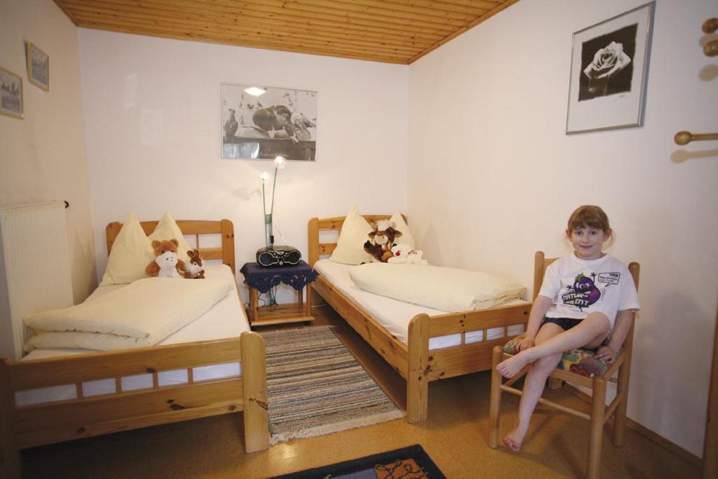 Postel nebo postele na pokoji v ubytování Ferienhaus Maxi