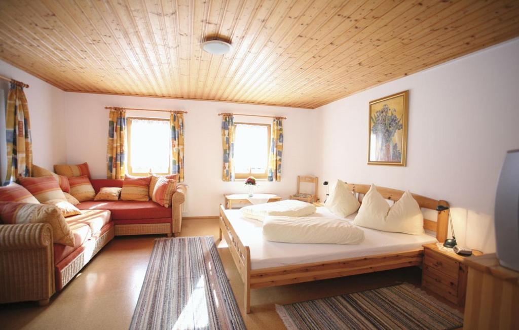 Postel nebo postele na pokoji v ubytování Ferienhaus Maxi