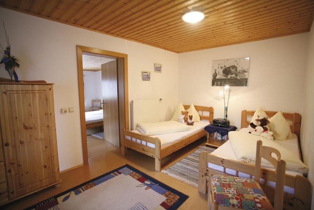 Postel nebo postele na pokoji v ubytování Ferienhaus Maxi