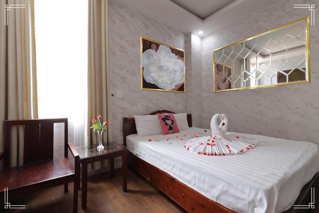 Postel nebo postele na pokoji v ubytování T Y Hotel