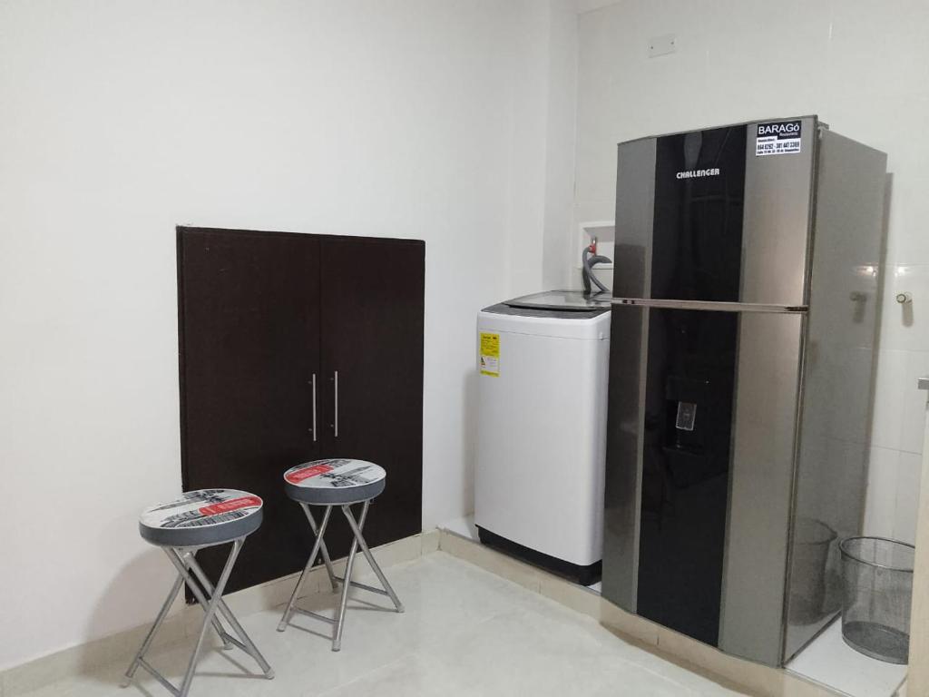 Kuchyň nebo kuchyňský kout v ubytování hermoso aparta - estudio ¡! capacidad 2 personas.