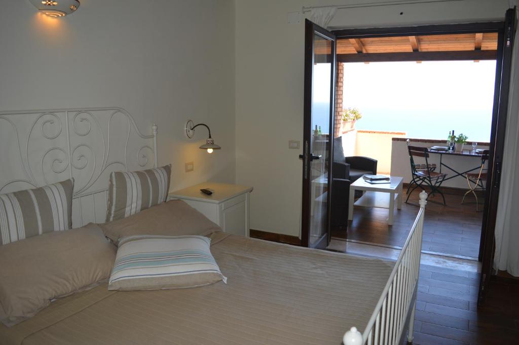 Posteľ alebo postele v izbe v ubytovaní Villa Russo Casa Vacanze