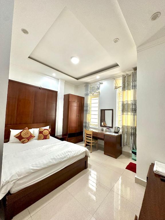Postel nebo postele na pokoji v ubytování Hoàng Anh hotel