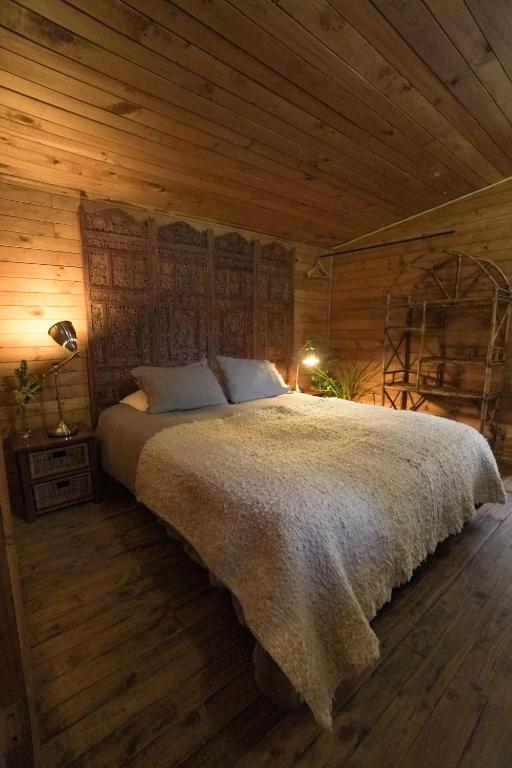 Rúm í herbergi á El Rincon Eco Hotel