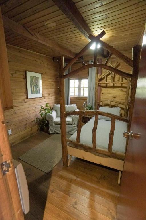 Rúm í herbergi á El Rincon Eco Hotel