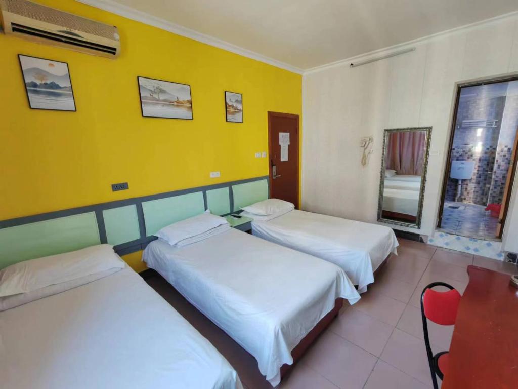 Postel nebo postele na pokoji v ubytování Dihao Hostel North Railway Station