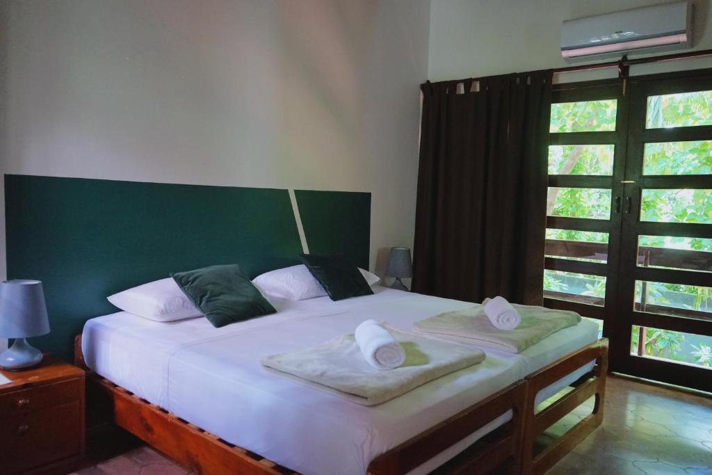 Postel nebo postele na pokoji v ubytování Hotel Villa Del Sol