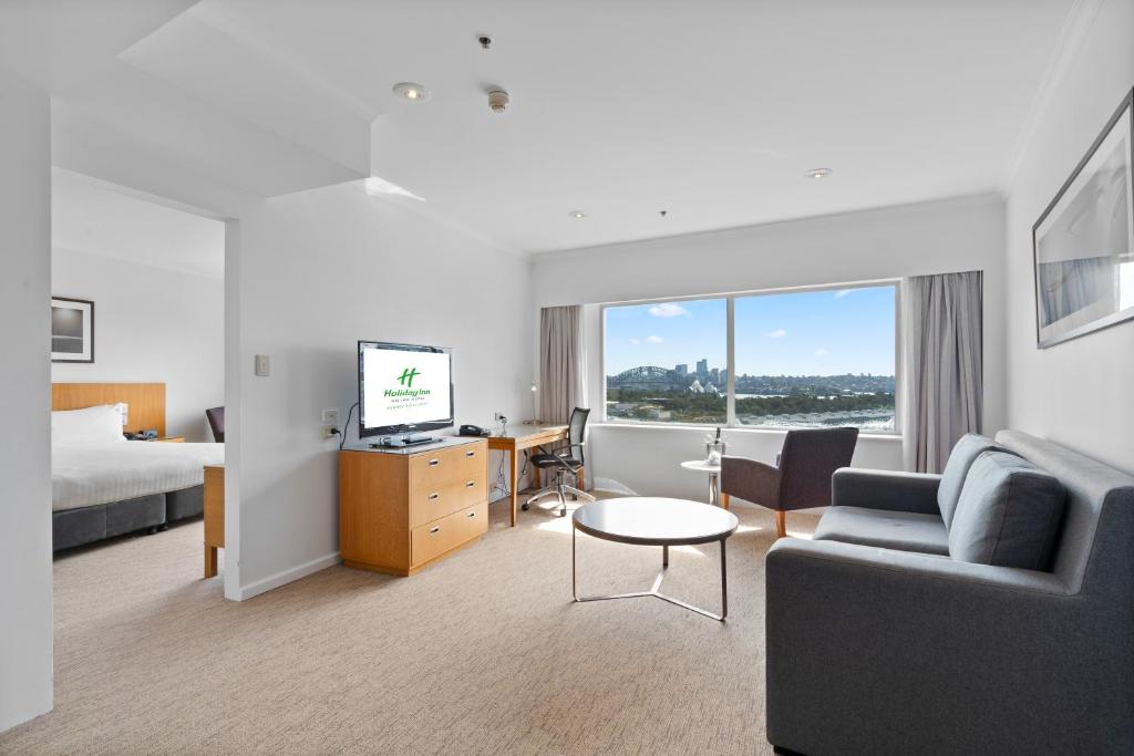 Postel nebo postele na pokoji v ubytování Holiday Inn Sydney Potts Point