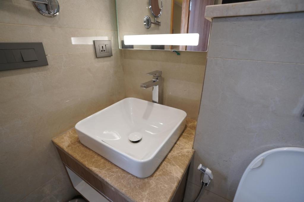 Koupelna v ubytování Udman Hotel Gurugram
