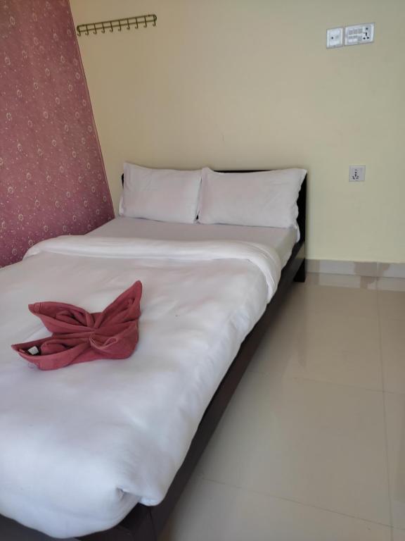 Ein Bett oder Betten in einem Zimmer der Unterkunft Hotel Green Hill View
