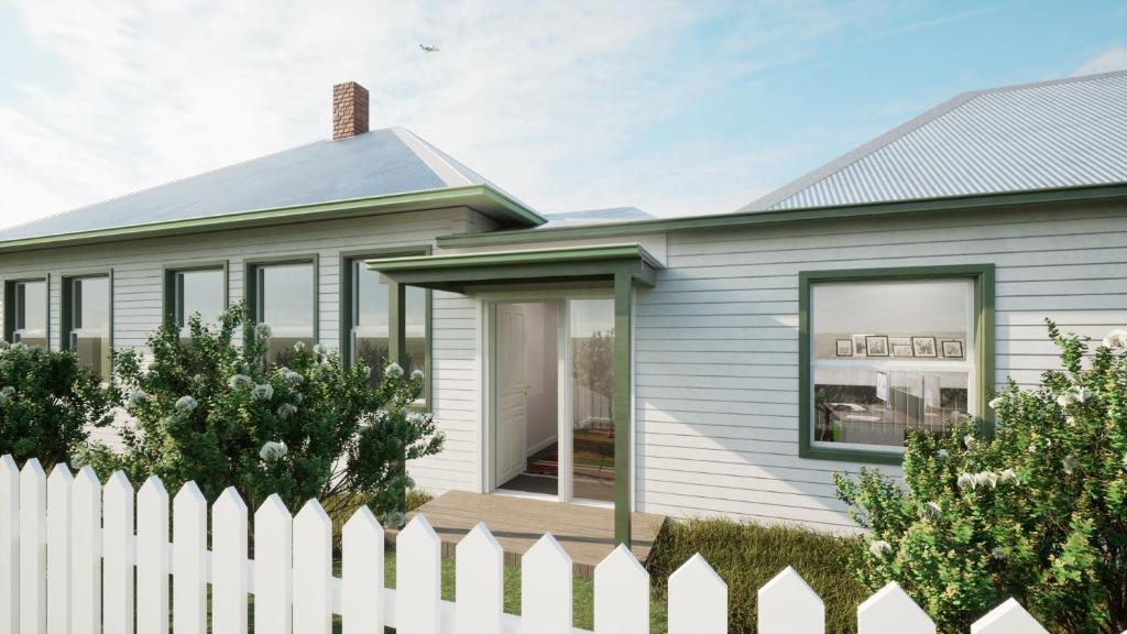 einen weißen Zaun vor einem Haus in der Unterkunft JMP FLINDERS ACCOMODATION in Flinders