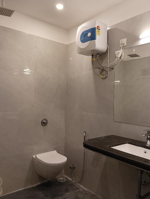 Un baño de Hotel Mewari Villa