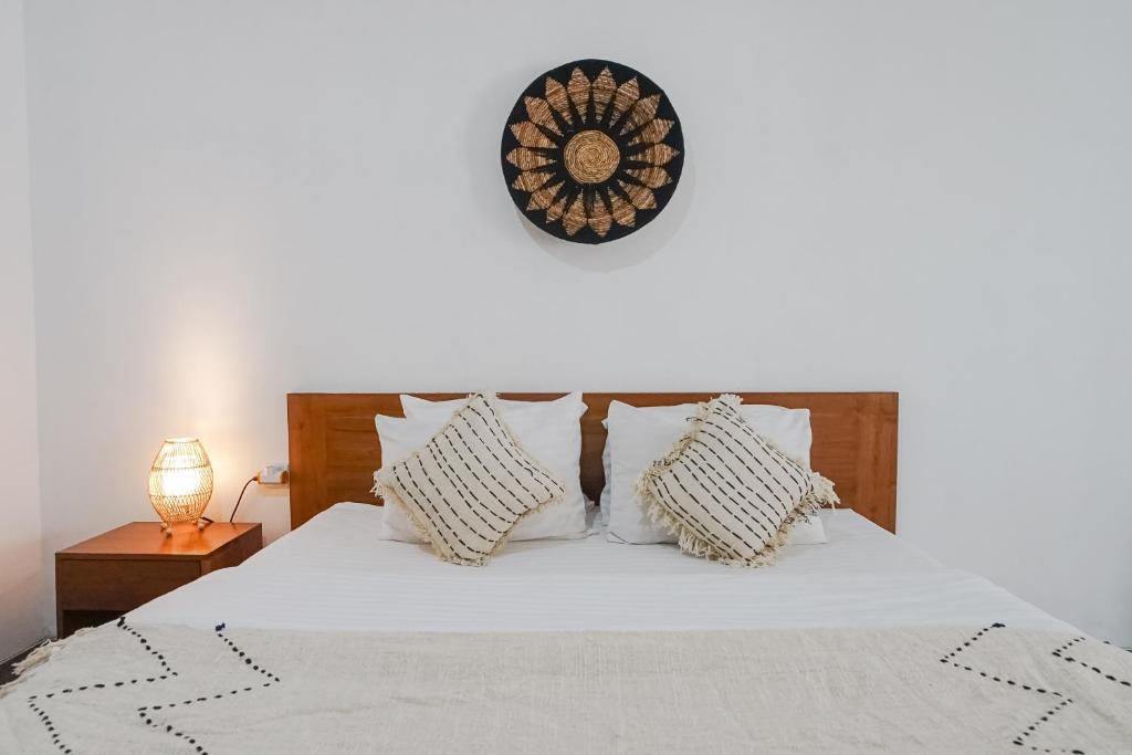 Postel nebo postele na pokoji v ubytování Maisaba Coliving Cempaka