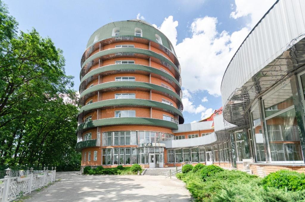 a building with a round building at Tisa Hotel in Kyiv