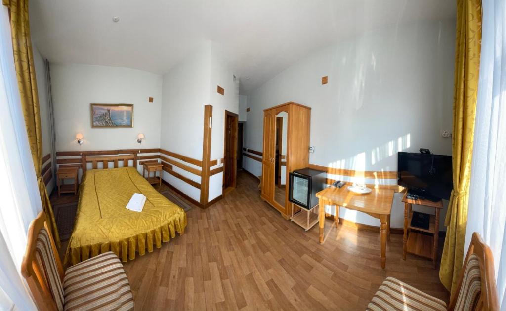 Postel nebo postele na pokoji v ubytování Tisa Hotel