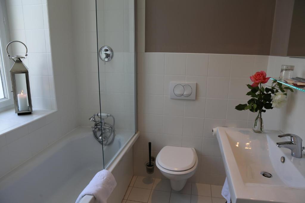 Koupelna v ubytování Hôtel Moderna