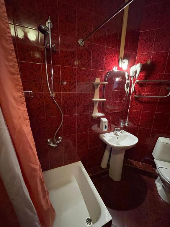 Koupelna v ubytování Tisa Hotel