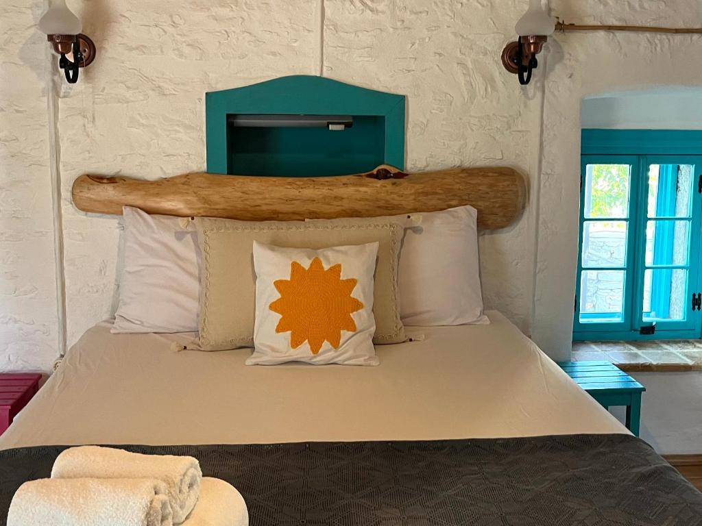 Postel nebo postele na pokoji v ubytování Güneş Butik Otel Datça