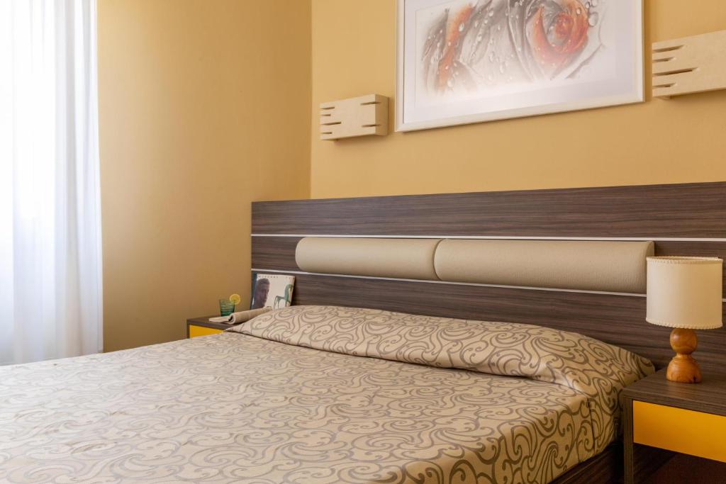 Postel nebo postele na pokoji v ubytování Park Hotel Residence