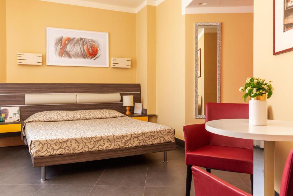 Postel nebo postele na pokoji v ubytování Park Hotel Residence