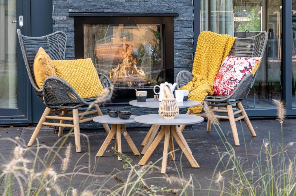 Posezení v ubytování Mooi Twente Lodges - privé Spa en sauna