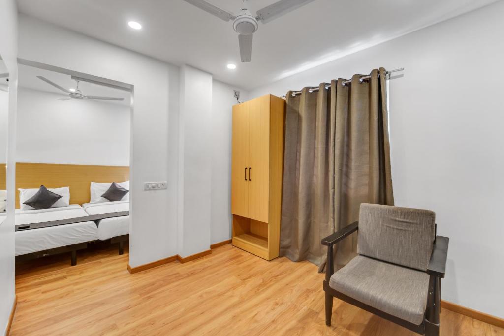 Postel nebo postele na pokoji v ubytování UPAR Hotels Thoraipakkam, OMR