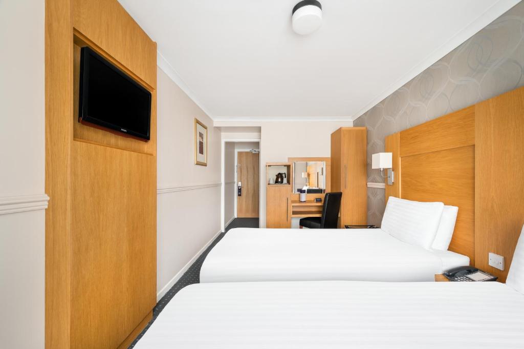 TV a/nebo společenská místnost v ubytování Rooms Inn