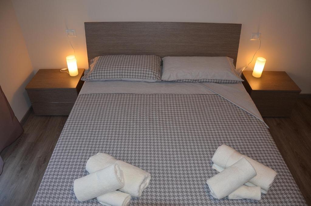 Postel nebo postele na pokoji v ubytování B&B Panorama Iseo