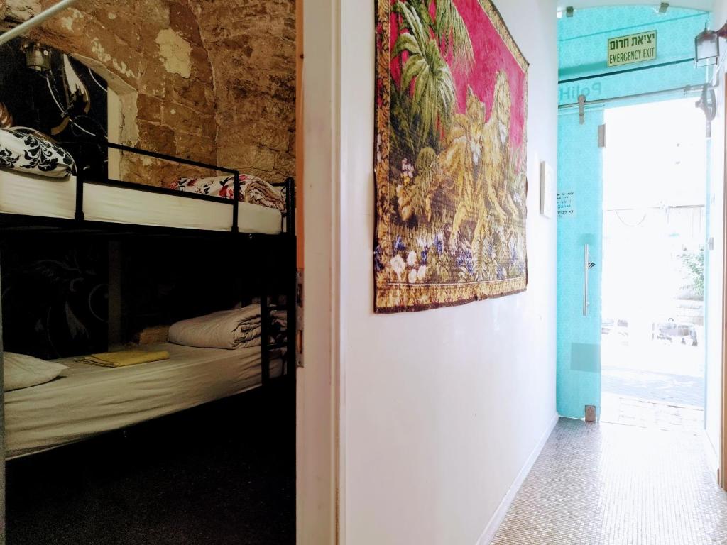 Postel nebo postele na pokoji v ubytování PoliHosts Old Jaffa