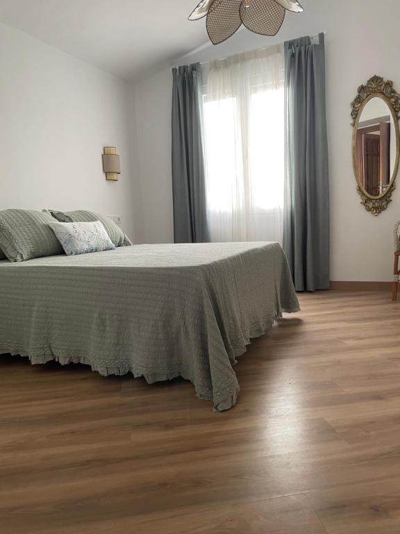 Posteľ alebo postele v izbe v ubytovaní El Paseo