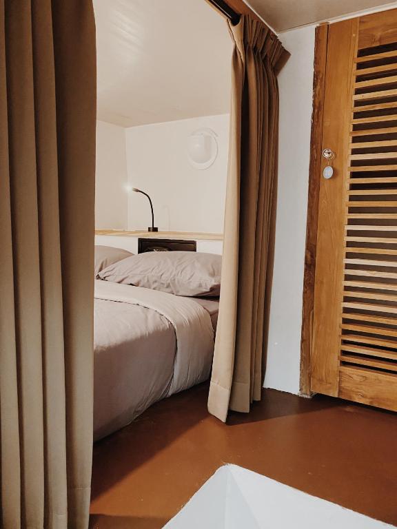 Postel nebo postele na pokoji v ubytování Kos One Hostel