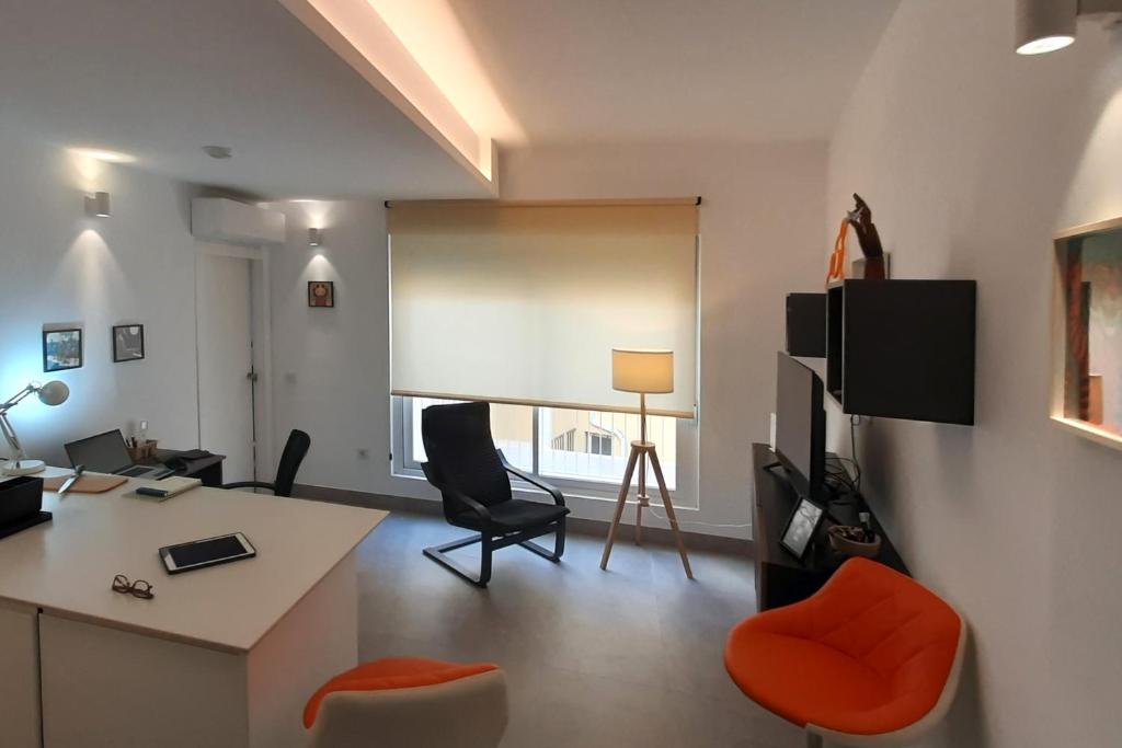 Televízia a/alebo spoločenská miestnosť v ubytovaní Apartment with two Suites in the Center of Malaga