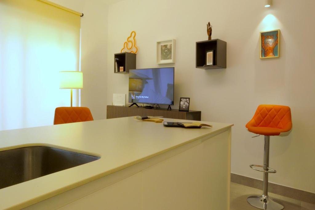 Televízia a/alebo spoločenská miestnosť v ubytovaní Apartment with two Suites in the Center of Malaga