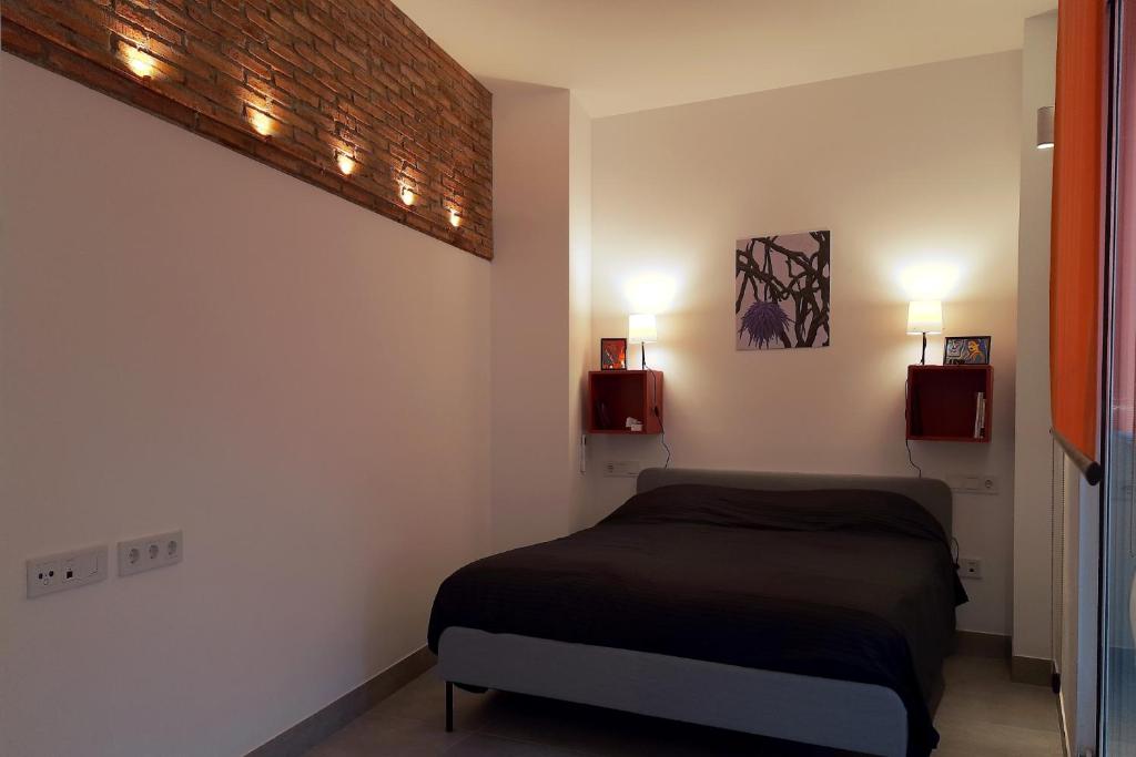 Posteľ alebo postele v izbe v ubytovaní Apartment with two Suites in the Center of Malaga