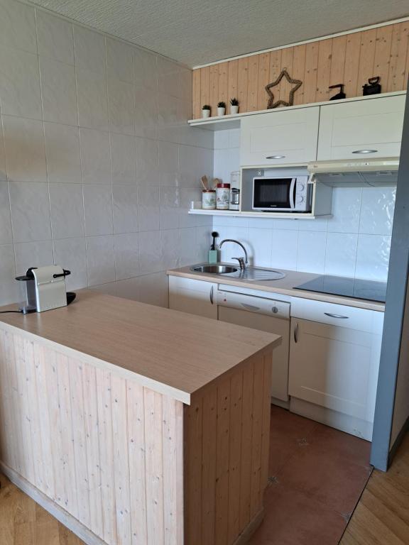 Kuchyň nebo kuchyňský kout v ubytování Apartamento Pas de la Casa - 6 pax