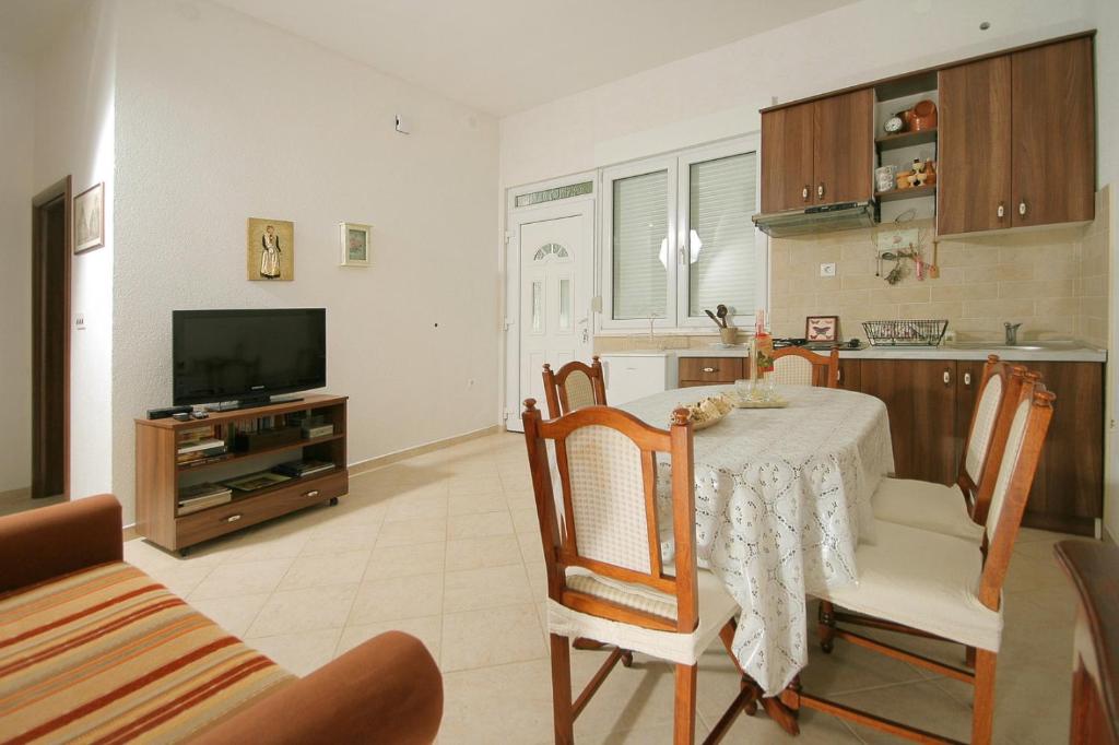 TV a/nebo společenská místnost v ubytování Apartments Parcela