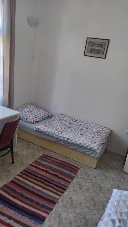Postel nebo postele na pokoji v ubytování Nároďák Jaroměř ,UBYTOVÁNÍ